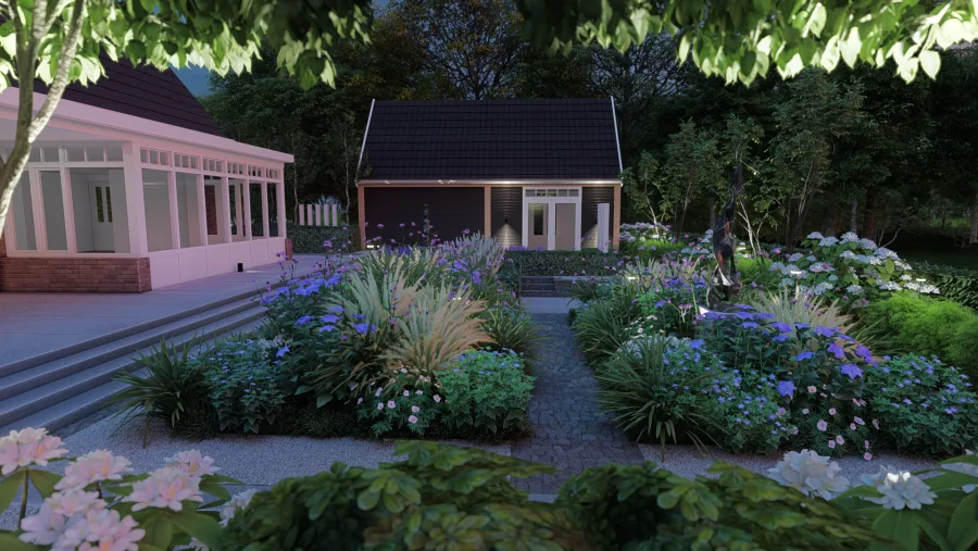 Avondtuin met sfeerverlichting en bloeiende borders